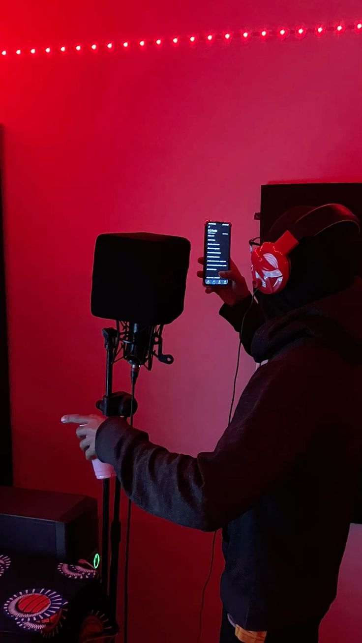 Close-up of a hand on a mixing console.